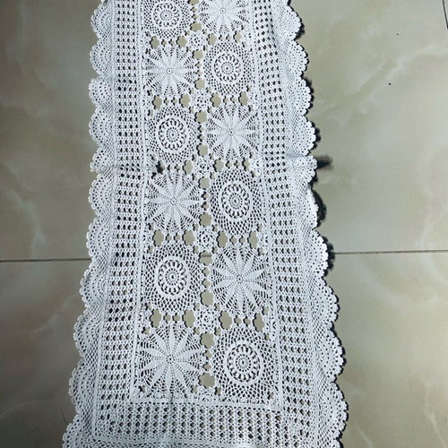 Handmade crocheted table runner used with cotton thread