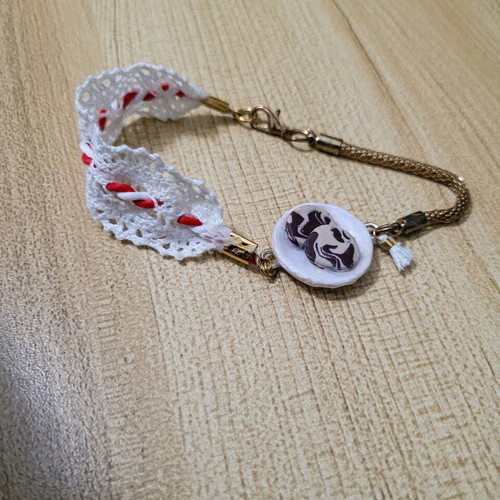 Martis bracelet like new, handmade with red and white thread
