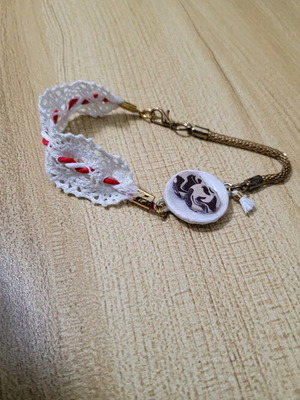 Martis bracelet like new, handmade with red and white thread
