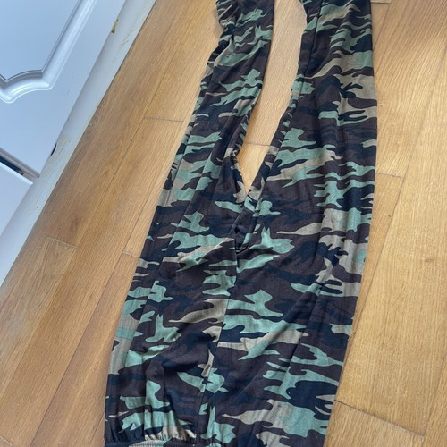 Leggings used, khaki camouflage and white with pink and black patterns, set of two