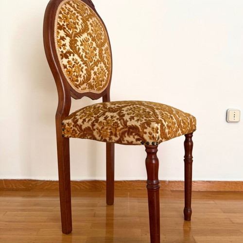 Chair used with wooden frame and brown velour fabric with floral pattern