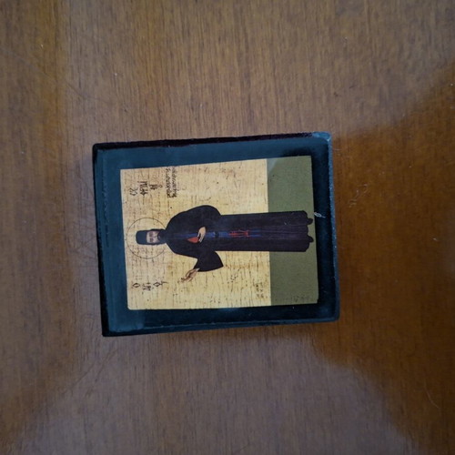 Religious icons used, including saints and Panagia images