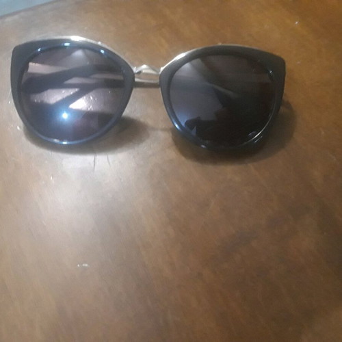 Rebecca Blu sunglasses used, black gold butterfly shape