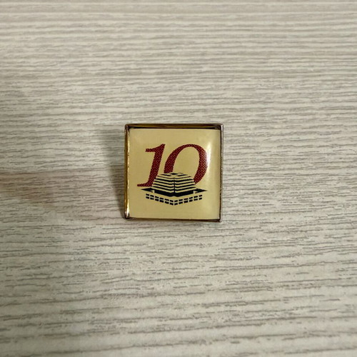 Commemorative pin for 10 years of Onassis Cardiac Surgery Center
