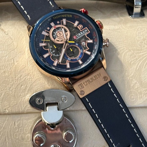 Curren men's watch new with leather strap blue and red