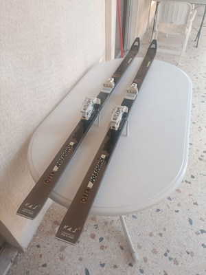 Open Rossignol XP11 V. A. S. Fibrometal ski used with Tyrolia 470 bindings and Kerma countach poles