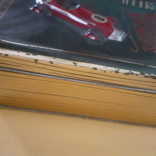 Collectible metal storage box in book style like new