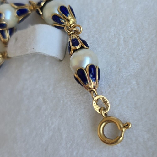 18K gold bracelet with white pearls and royal blue enamel