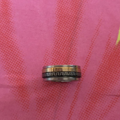 Spinning ring stainless steel with Greek key pattern, gold and silver