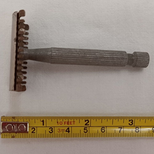 Collectible Open Comb Safety Razor used, brass head, 1940s–50s