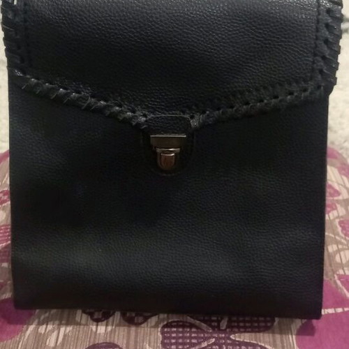Black synthetic backpack bag used