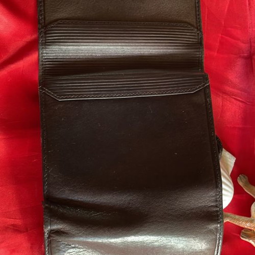 Brown leather wallet used with multiple compartments