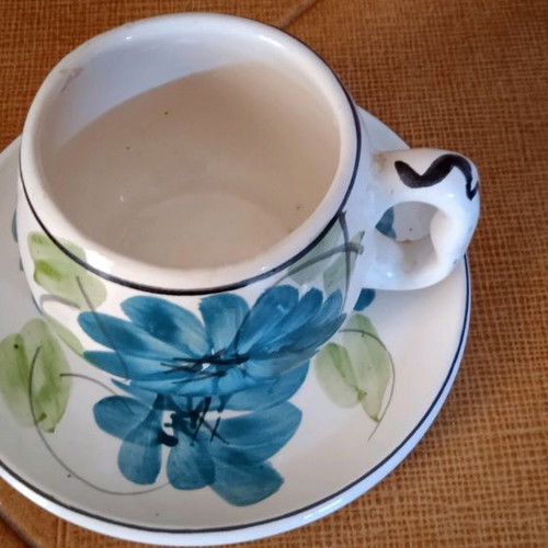 Ceramic cup and saucer set used, tea size