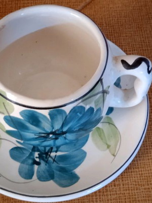 Ceramic cup and saucer set used, tea size