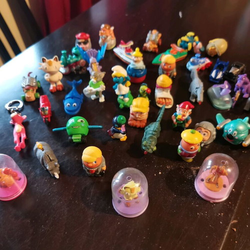 Vintage collection of 41+ used Kinder Surprise toys