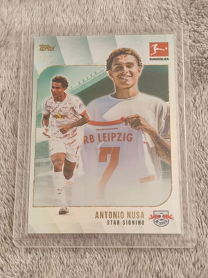 2024-25 Topps Bundesliga Summer Signings Antonio Nusa Star Signing Orange Parallel /25