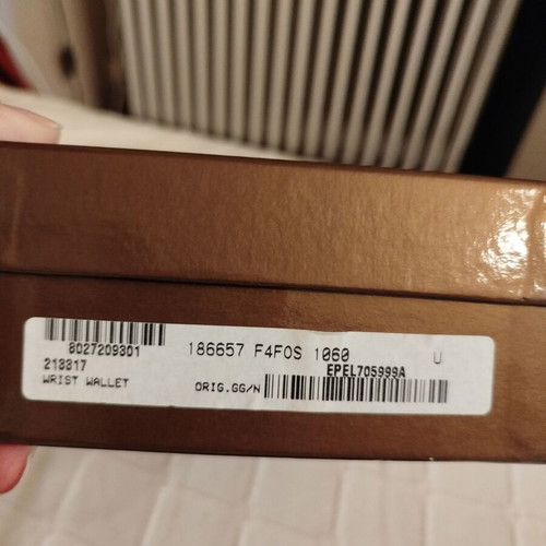 Gucci fabric wrist pouch like new, black