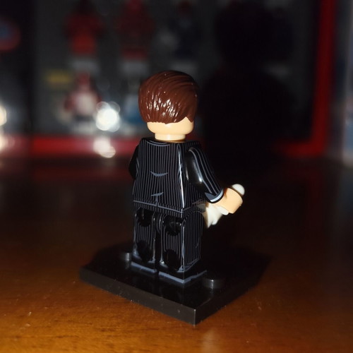 Tony Stark Iron Man Lego minifigure with stand and white cup