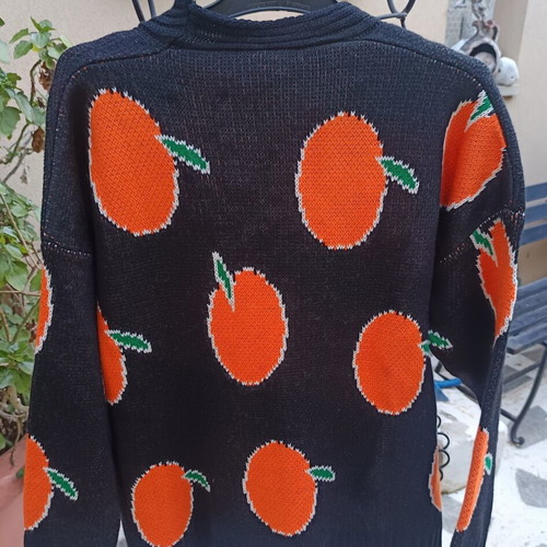 Knitted winter cardigan with buttons one size new, black with orange fruit design