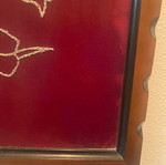 Embroidered painting like new with gold thread on red fabric
