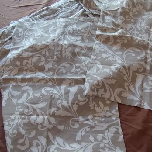 Two IKEA duvet covers and four matching pillowcases