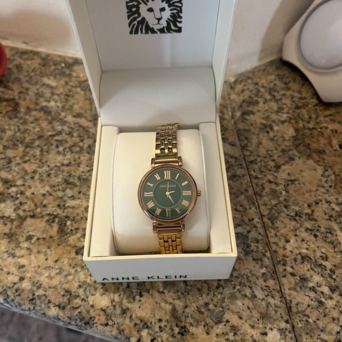 Anne Klein women's watch like new, green and gold
