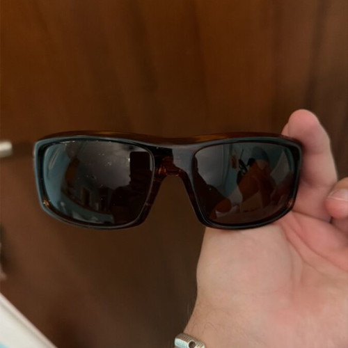 Sunglasses used, brown color