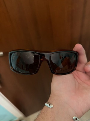 Sunglasses used, brown color