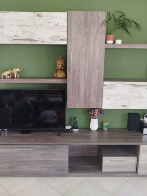 Living room unit like new with large storage capacity