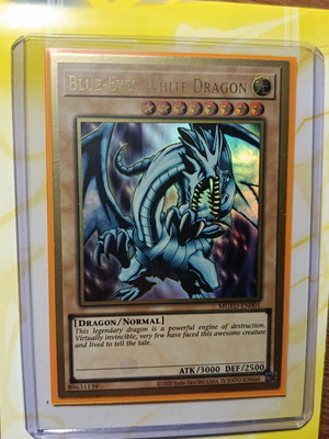 Blue Eyes White Dragon card like new with Ultra Pro sleeve and Top Loader
