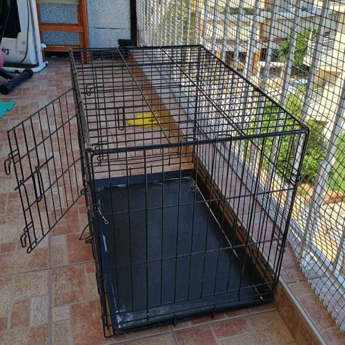 Pet crate used, size M, black with 2 doors