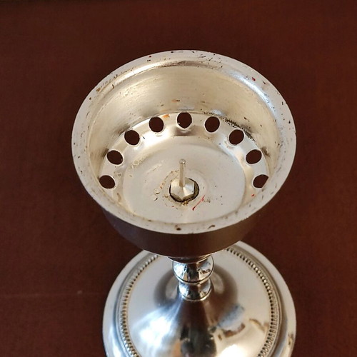 Small candlestick like new with glossy metal finish 14cm height