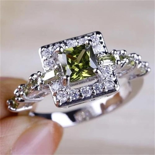 Ring with peridot and white zirconia new, silver plated metal