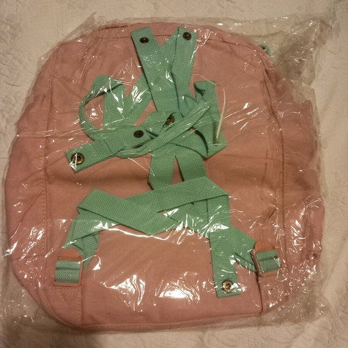 Backpack new with pockets and zipper, 70% cotton 30% polyester