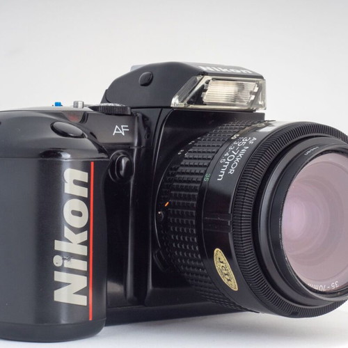 Nikon F-401X 35mm film camera with original leather strap