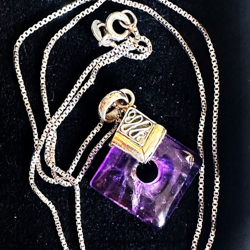Vintage pendant with amethyst in 925 silver and gold