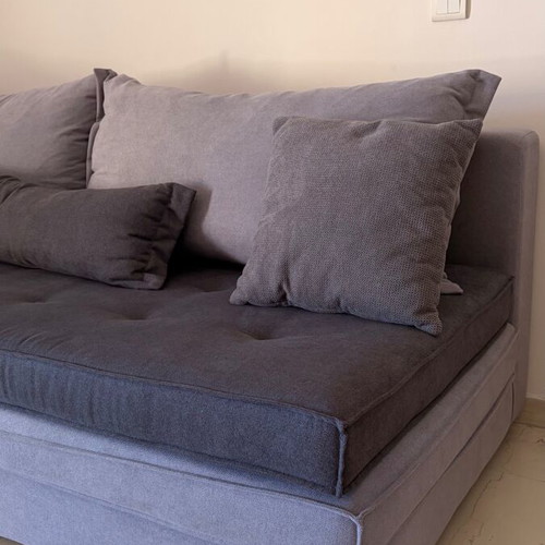 Two-seater sofa like new with reversible gray seat