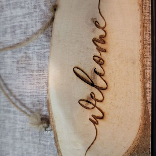 Wooden welcome sign from natural log new