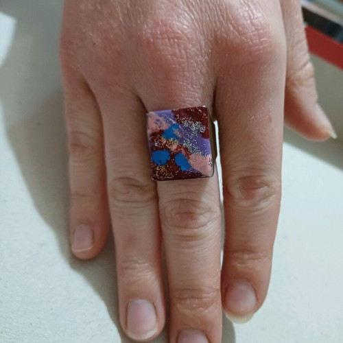 Ring like new painted with colors and glitter