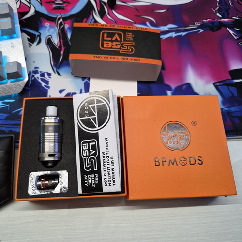 Labs atomizer BP Mods used with ready coils, one drip tip missing
