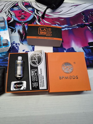 Labs atomizer BP Mods used with ready coils, one drip tip missing