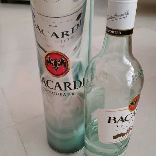 Pack of 2 old drinks, 1 vodka and 1 Bacardi, like new