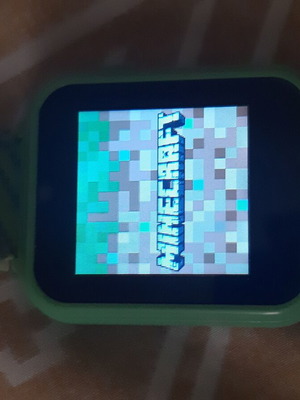 Minecraft smartwatch like new with games, camera, and voice recording