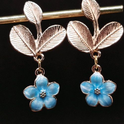 Handmade hypoallergenic earrings with blue iridescent flowers