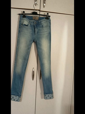 Blue light denim pants with pearls and rhinestones at hem like new