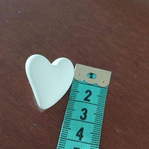 Heart earrings new, off-white color