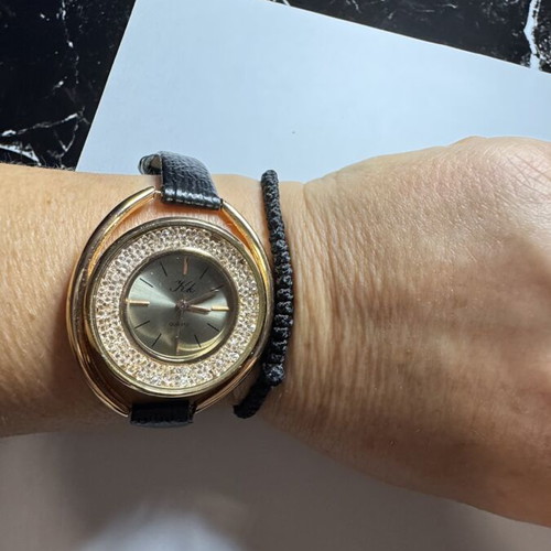 Wristwatch with rhinestones, black and gold