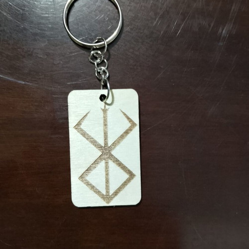Laser Engraved Berserk Keychain like new, plywood