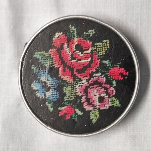 Vintage small portable mirror used with floral design