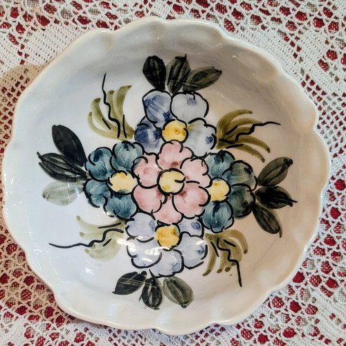Vintage handmade ceramic bowl with traditional floral design, 16 cm